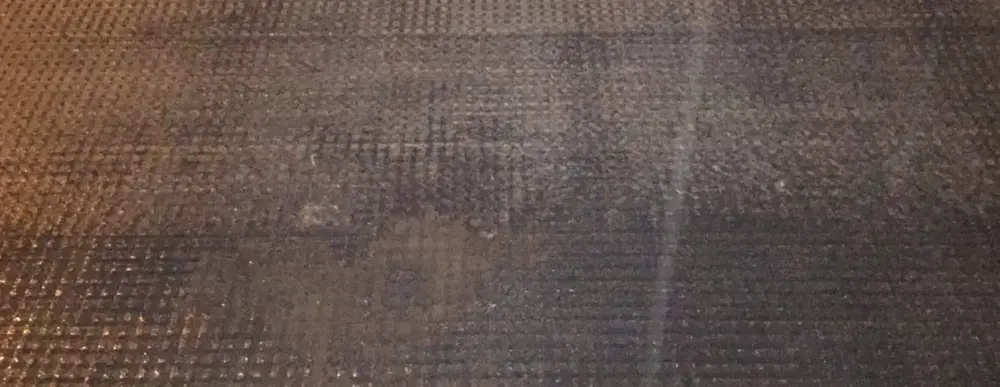 Geocomposites for crack reflection